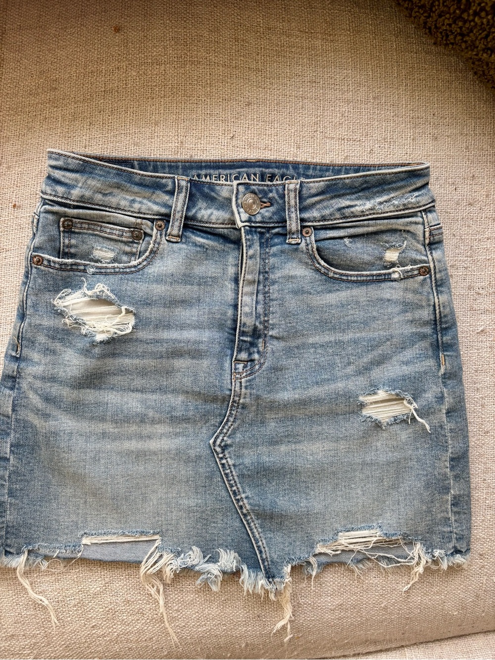 AE Light Blue Super Stretch Distressed Denim Mini Skirt with Frayed Hem